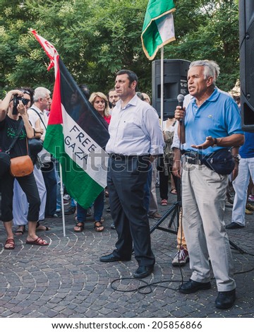MILAN, ITALY - JULY 16: People gather and protest against Gaza strip bombing in solidarity with Palestinians on JULY 16, 2014 in Milan.