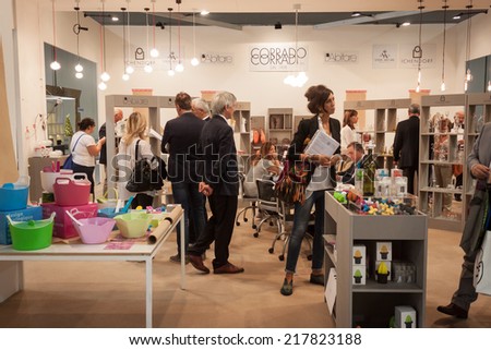 MILAN, ITALY - SEPTEMBER 13: People visit HOMI, home international show and point of reference for all those in the sector of interior design on SEPTEMBER 13, 2014 in Milan.