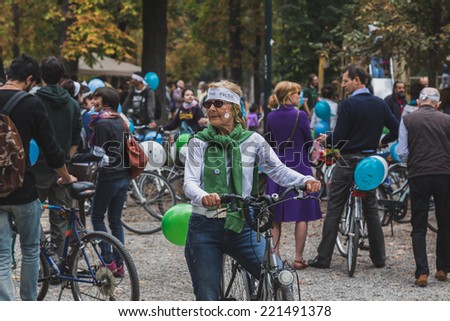 MILAN, ITALY - OCTOBER 4: People take part in the Ice Ride, global bike event organized by Greenpeace to demand protection for the Arctic on OCTOBER 4, 2014 in Milan.