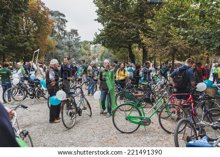 MILAN, ITALY - OCTOBER 4: People take part in the Ice Ride, global bike event organized by Greenpeace to demand protection for the Arctic on OCTOBER 4, 2014 in Milan.
