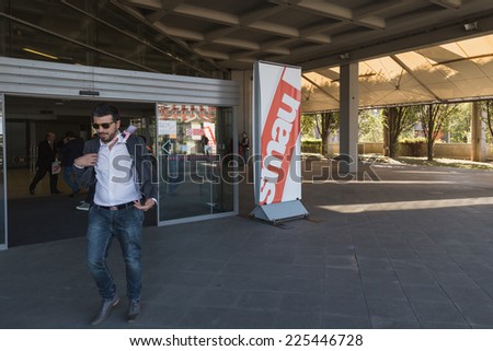 MILAN, ITALY - OCTOBER 22: Man visits Smau, international exhibition of information communications technology on OCTOBER 22, 2014 in Milan.