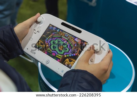MILAN, ITALY - OCTOBER 24: Detail of Nintendo Wii at Games Week 2014, event dedicated to video games and electronic entertainment on OCTOBER 24, 2014 in Milan.