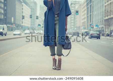 Similar – Image, Stock Photo Woman in stylish boots with red suitcase standing on road