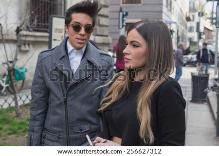 MILAN, ITALY - FEBRUARY 26: People gather outside Anteprima fashion show building for Milan Women\'s Fashion Week on FEBRUARY 26, 2015  in Milan.