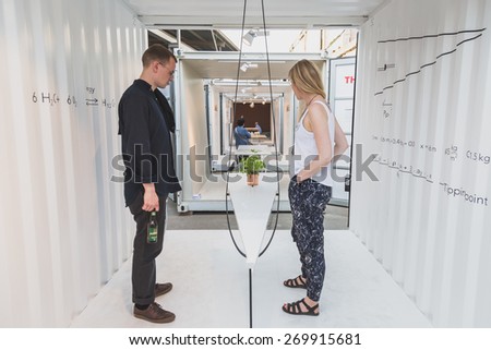 MILAN, ITALY - APRIL 15: People visit Fuorisalone at Ventura Lambrate space, location of important events during Milan Design Week on APRIL 15, 2015 in Milan.