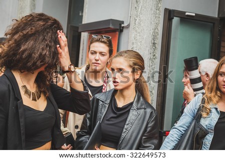 MILAN, ITALY - SEPTEMBER 27: People gather outside Laura Biagiotti fashion show building for Milan Women\'s Fashion Week on SEPTEMBER 27, 2015  in Milan.