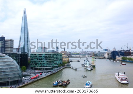 Beautiful breath-taking panoramic scenic view on London\'s cityscape from the Tower Bridge Exhibition. Spectacular view of the Shard, HMS Belfast and the City from the West Walkway
