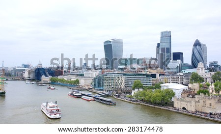 Beautiful breath-taking panoramic scenic view on London\'s cityscape from the Tower Bridge Exhibition. Spectacular view of St. PaulÃ¢??s Cathedral dome, the Gherkin and the City from the West Walkway
