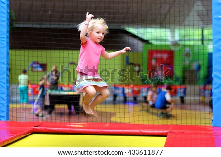 Similar – Image, Stock Photo Child jumping on playground