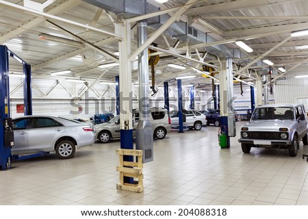 MOSCOW. RUSSIA - JUNE 11, 2014: Cars for repair service station. Auto Service is the official dealer of Auto VAZ
