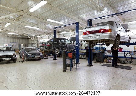 MOSCOW. RUSSIA - JUNE 11, 2014: Cars for repair service station. Auto Service is the official dealer of Auto VAZ