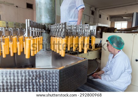 NIZHNY TAGIL, RUSSIA - APRIL 24, 2015: Automatic production line of fruit ice and ice cream