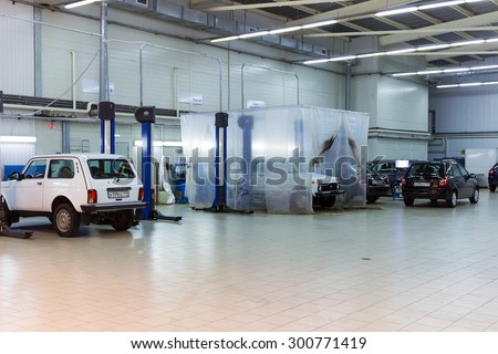 MOSCOW, RUSSIA - JULY 01, 2015: Cars for repair service station. Auto Service is the official dealer of Auto VAZ