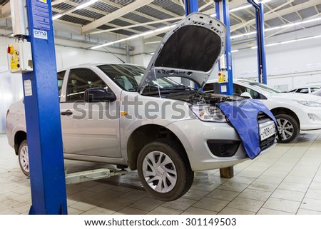 MOSCOW, RUSSIA - JULY 01, 2015: The car on the lift. Change engine oil and transmission inspection