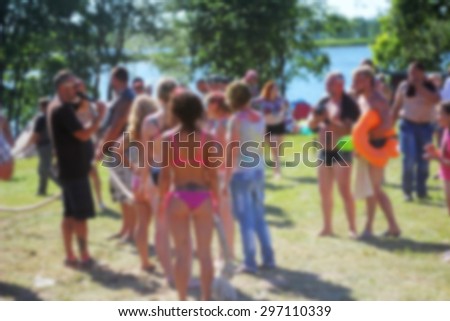 Blurred people on a summer festival