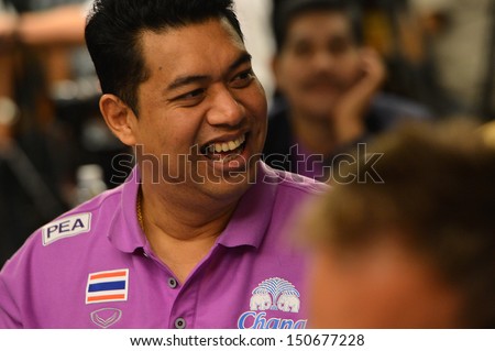 BANGKOK,THAILAND-AUGUST15,2013:Kiattipong Radchatagriengkai head coach of Thai at meeting room during press conference Volleyball WGP 2013 at Golden Tulip hotel on August15,2013 in Bangkok,Thailand