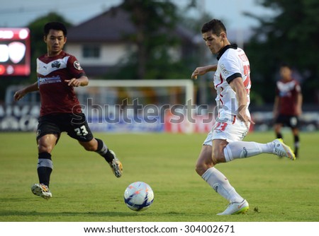 Bangkok,THA- July1: Cleton.S (R) of MTUTD in action in action during the competition League Cup 2015 between Police Utd and MTUTD at Police United Stadium on July1,2015 in Bangkok, Thailand
