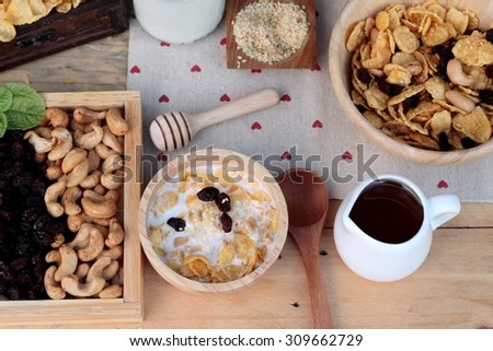 Corn flake with currant dried fruit ,cashew nuts and milk