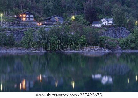 group of villas reflect on lake