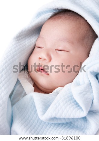 sleeping child in blue blanket having sweet dreams