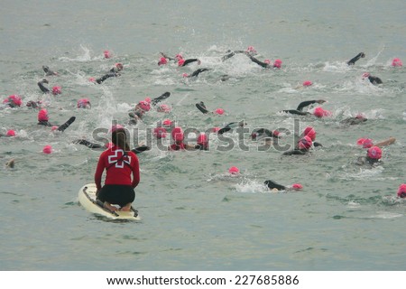 Barcelona, Spain - October 5th of 2014: Triathletes on their first meters of the swimming race during Barcelona Garmin Triathlon event, Barcelona, Catalonia, Spain