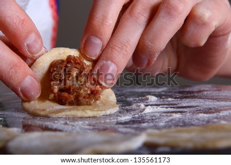 hand made ravioli getting prepared on table