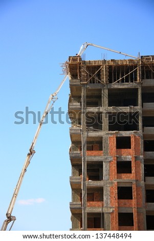 construction of building with cement mixture machine