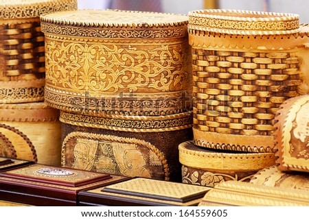 Several containers for bulk products made from birch bark.