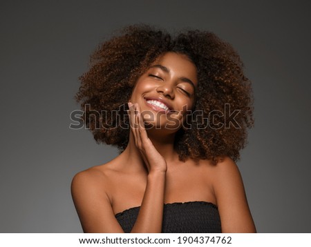 Image, Stock Photo Stylish black model with disco ball in neon light