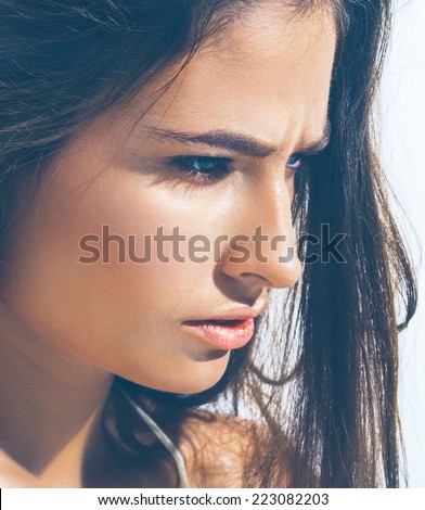 beautiful natural woman portrait with shine skin and health hair