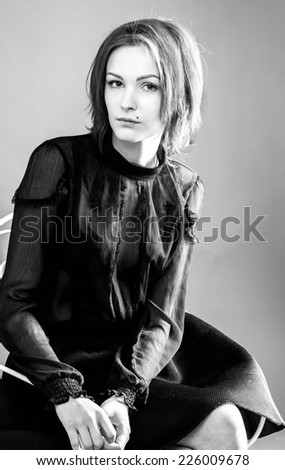 young beautiful woman portrait black and white in studio