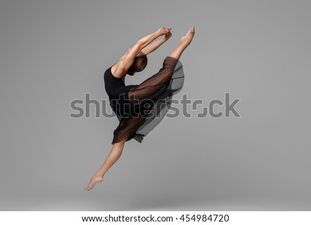 Similar – Image, Stock Photo Flexible female dancer doing splits in studio