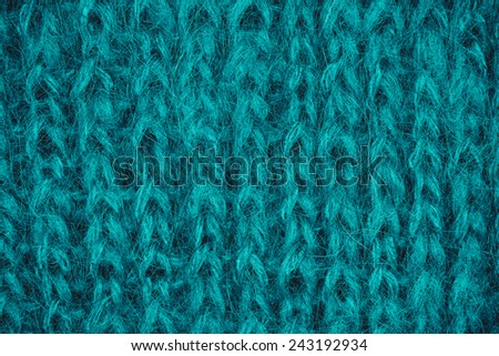 Blue knitting wool texture background.