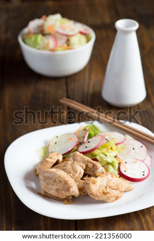 Braised chicken breast with a salad of radish