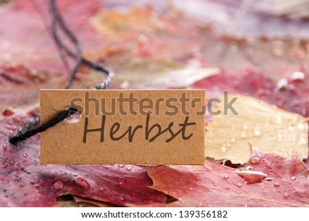 a label tag with the german word Herbst, which means autumn or fall, on it