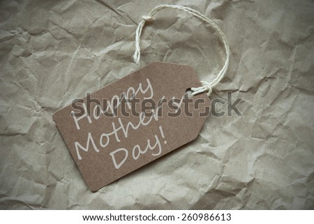 One Beige Label Or Tag With White Ribbon On Crumpled Paper Background With English Text Happy Mothers Day Vintage Or Retro Style With Frame