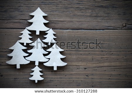 Christmas Trees On  Brown Wooden Background With Copy Space For Your Text Here Or Free Text. Vintage Style And Frame. Close Up Or Macro View.