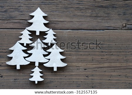 Christmas Trees On  Brown Wooden Background With Copy Space For Your Text Here Or Free Text. Vintage Style. Close Up Or Macro View.