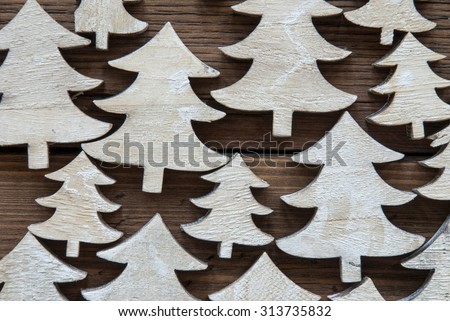 Macro Or Close Up Of Christmas Trees On  Brown Wooden Background With Copy Space For Your Text Here Or Free Text. Vintage Style.