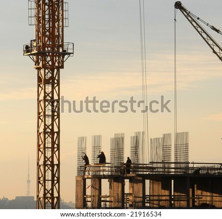 construction activity. Silhouette of construction worker