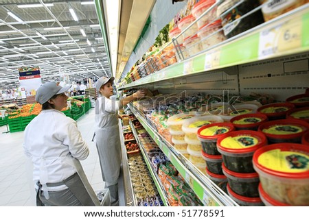 KYIV, UKRAINE - NOVEMBER 13: Worker in supermarket during preparation for the opening of the first store of OK supermarket network on November 13, 2007 in Kyiv, Ukraine.