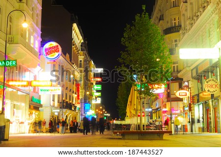 VIENNA, AUSTRIA - SEPT 23, 2013: Vienna city centre with many tourists at night . Tourism generated 8.4% of Austrian gross domestic product  and provided 181 thousand jobs