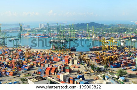 SINGAPORE - MARCH 07, 2013: Singapore industrial port. It is the world\'s busiest port in terms of total shipping tonnage, it tranships a fifth of the world\'s shipping containers.