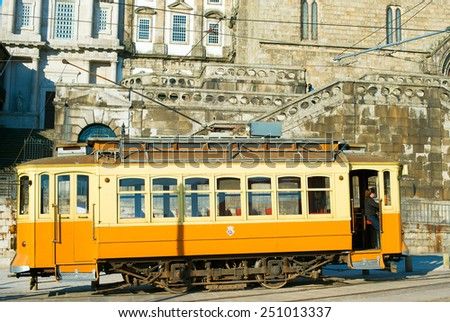 PORTO, PORTUGAL - JAN 12, 2014: Heritage tram in the center of Porto, Portugal. Famous tourist attraction.