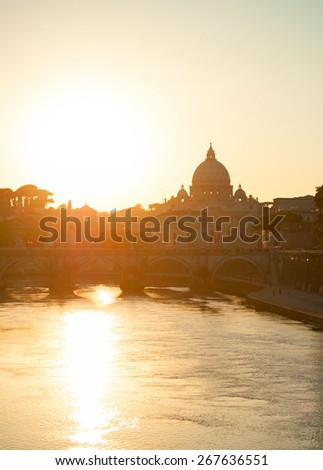 Sunset view of Tiber river and St. Peter\'s cathedral. Vatican, Rome