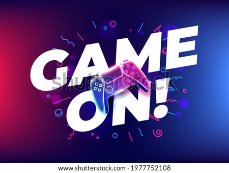 Game on, Neon game controller or joystick for game console on blue background.