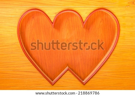 the wood texture with heart on the wall in home