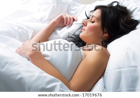 Beautiful and attractive young brunette sleeping