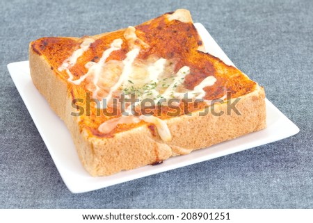 Pizza toasted bread with tomato sauce and cheese