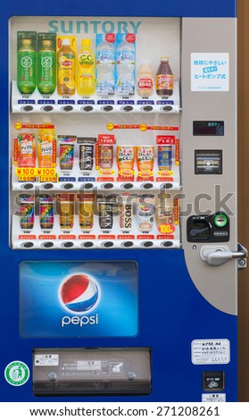 TOKYO, JAPAN - APR 09, 2015 : Vending machines of various company in Tokyo. Japan has the highest number of vending machine per capita in the world at about one to twenty three people.